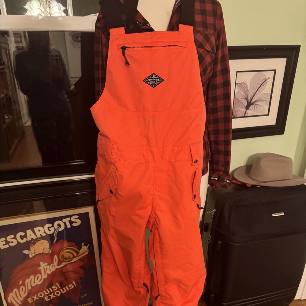 686 women’s snowboard bibs sm orange